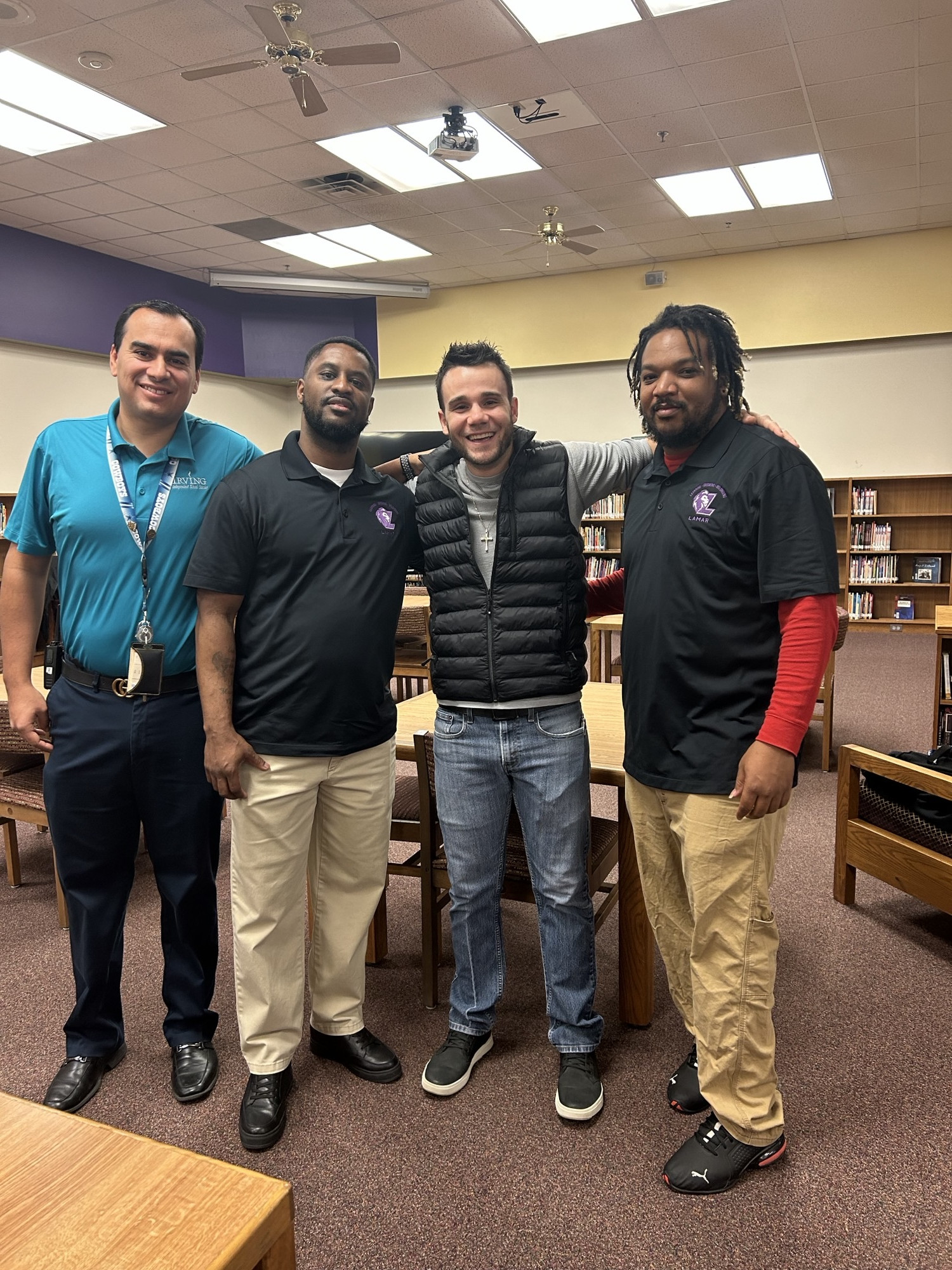 Matt Young with event organizers at the All Pro Dad event