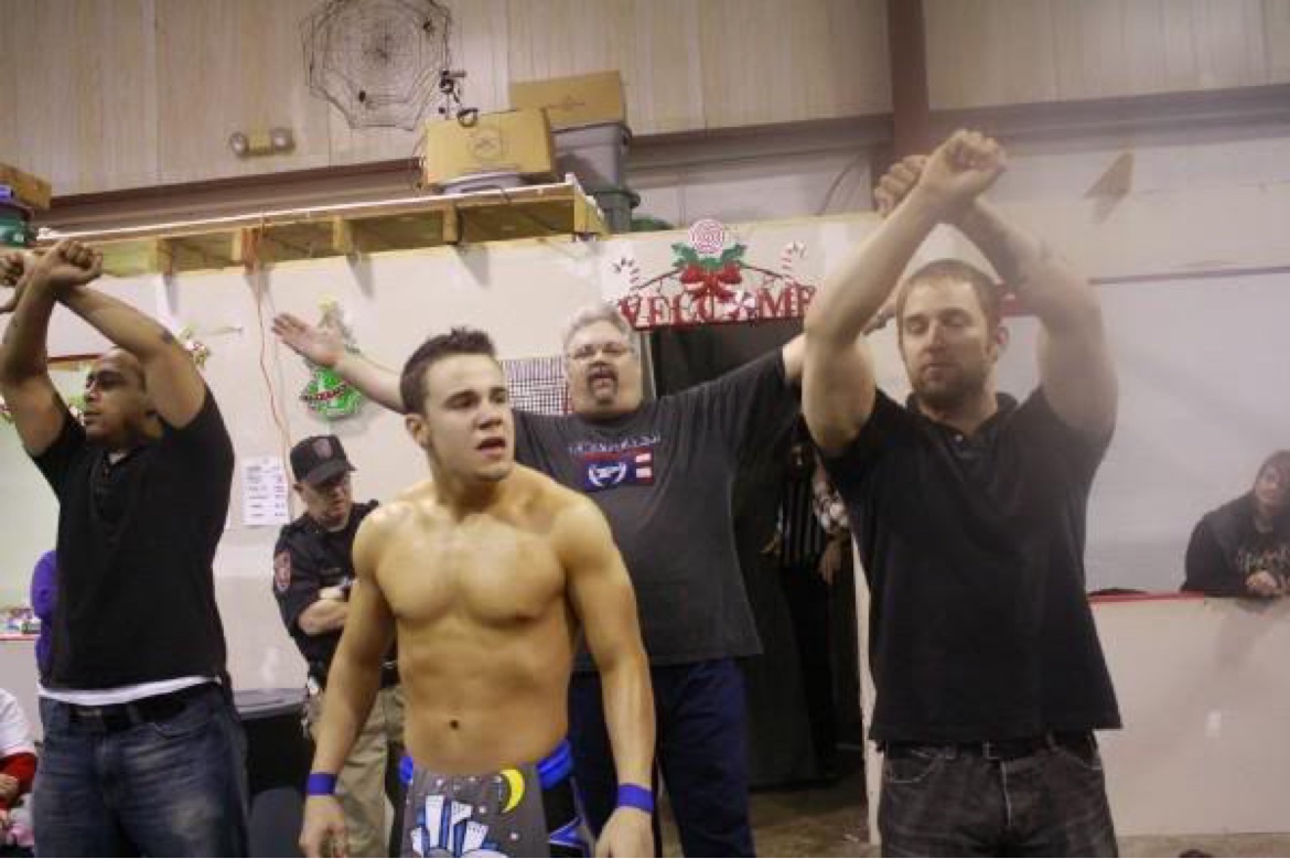 Locker room celebration with fellow wrestlers