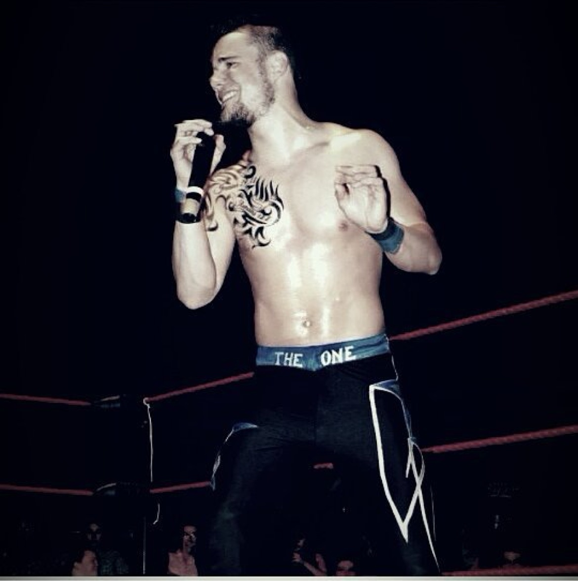 Matt Young posing with a championship title